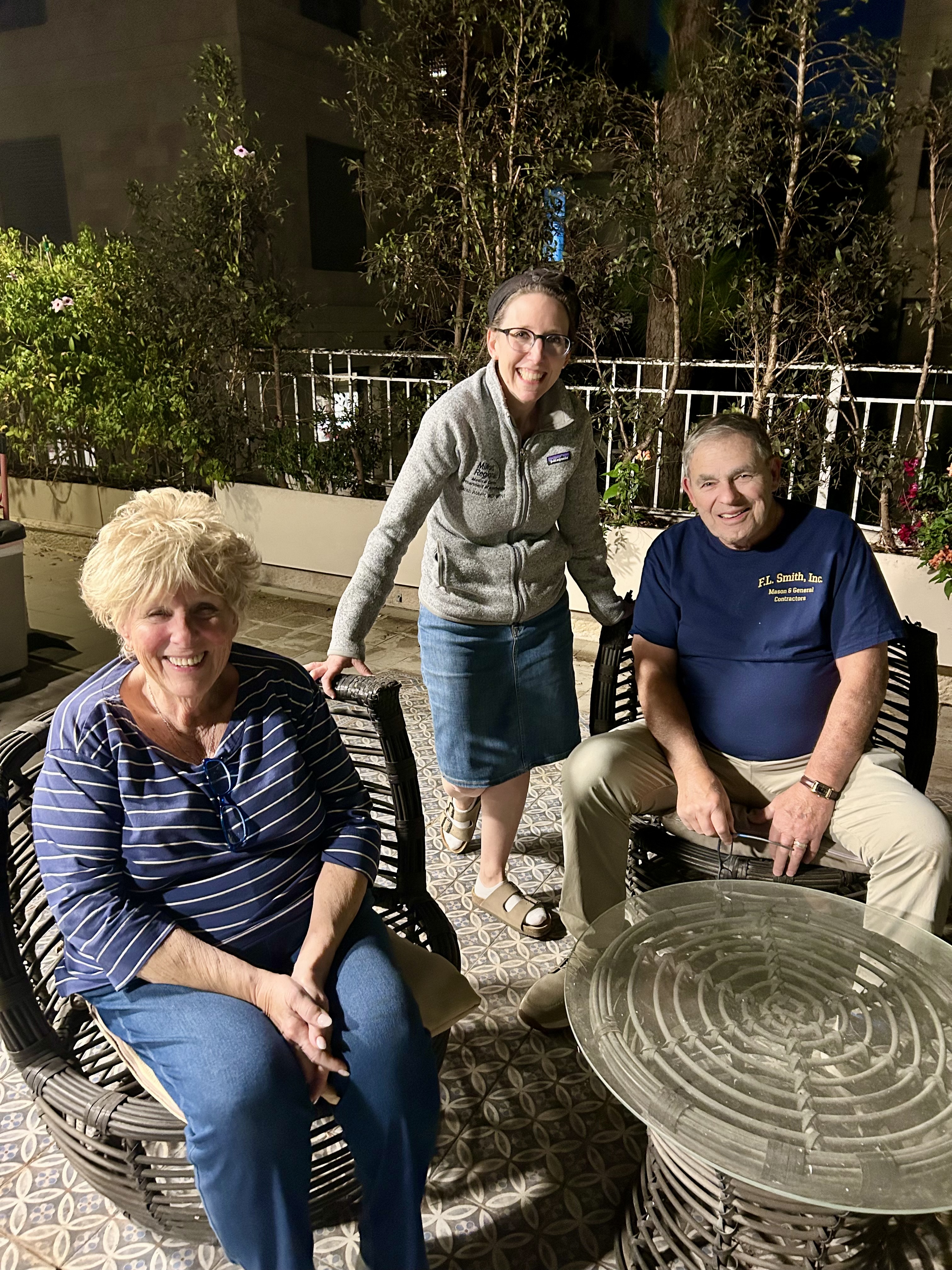 Karen, Sarah, and Ted enjoy some fresh air on our patio