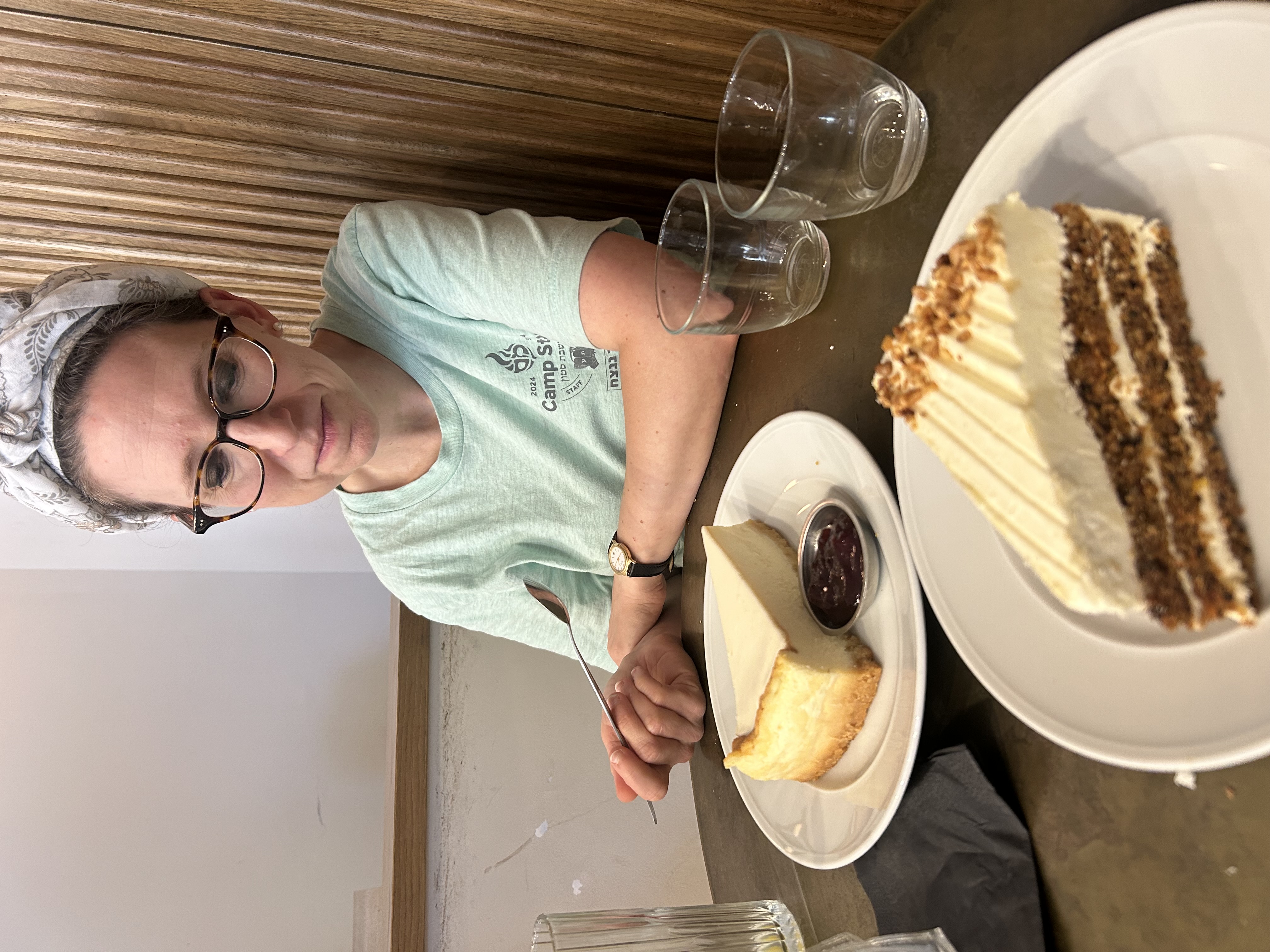 Careful consideration of our slices of cheesecake and carrot cake