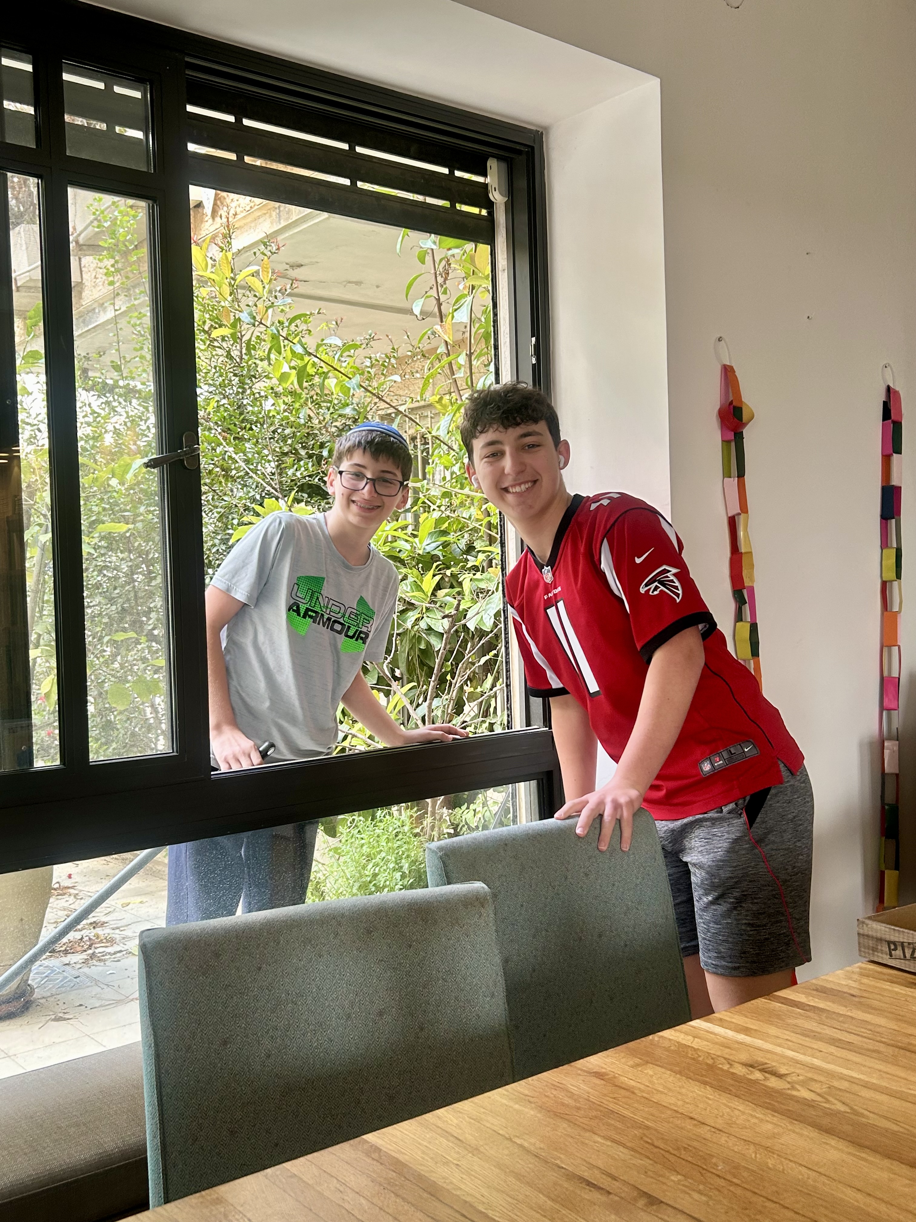 Tidying up the house and patio before Shabbat