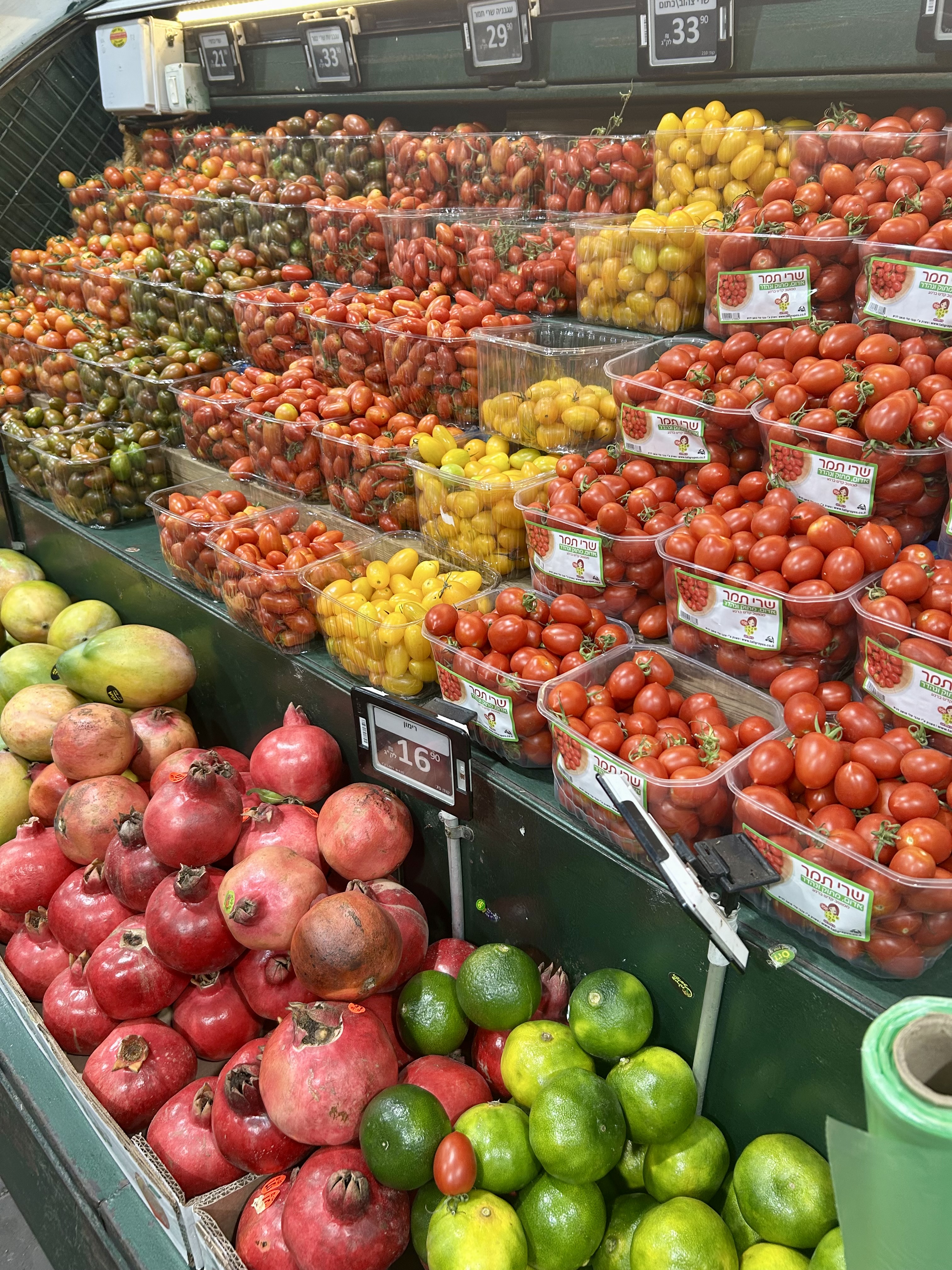 Beautiful rainbow of cherry tomatoes at Super Hamoshava.