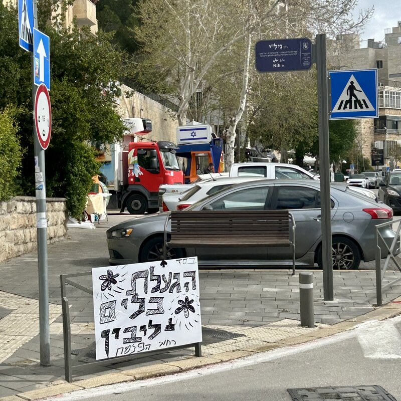 A sign advertising the friendly neighborhood “utensil boiling” station, to kosher-sanitize metal items for use on Passover. These pop up across the city.