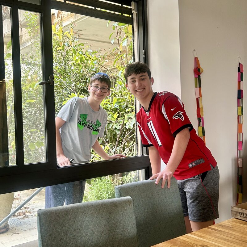 Tidying up the house and patio before Shabbat